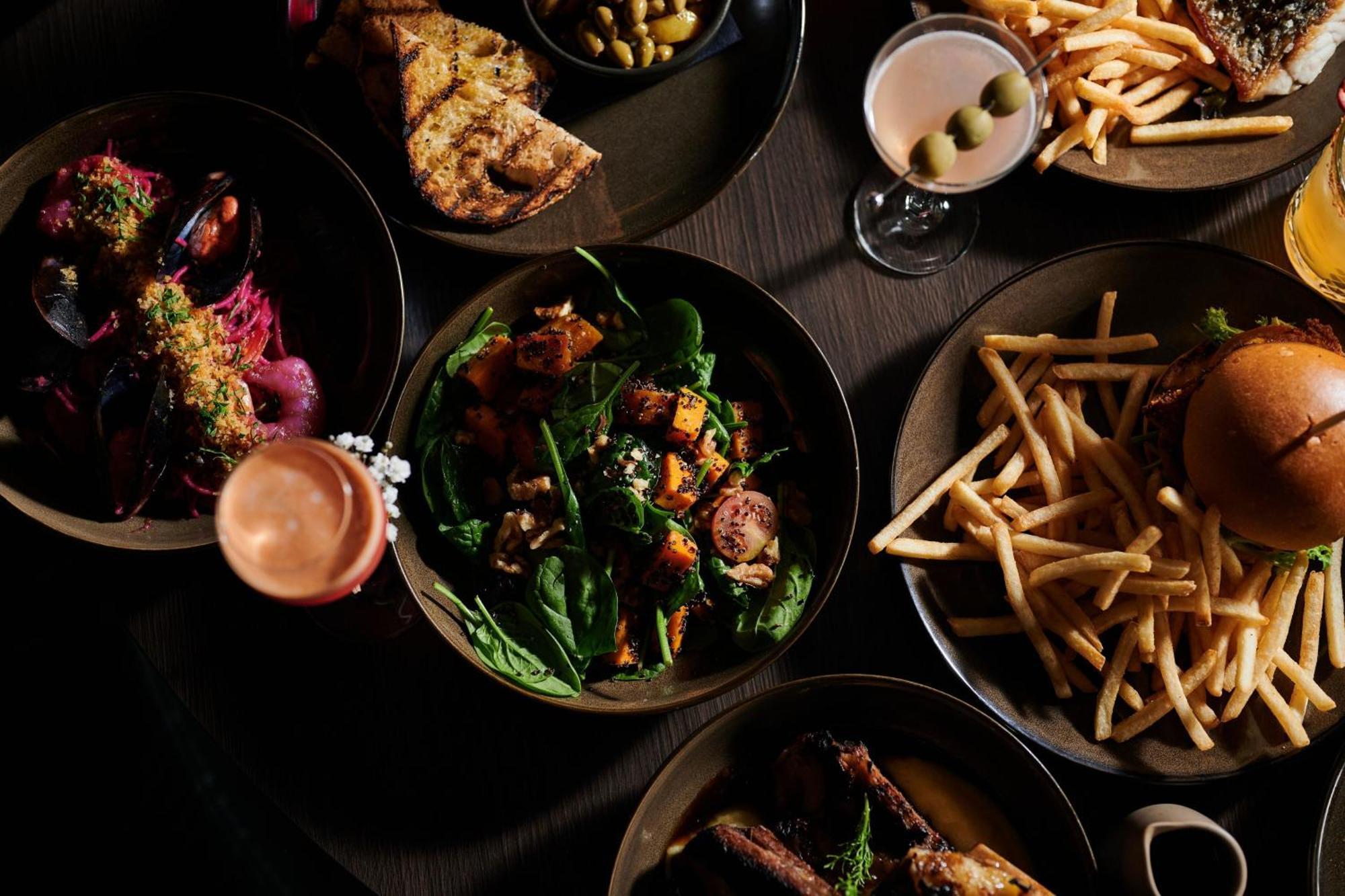 Midnight Hotel, Autograph Collection Κανμπέρα Εξωτερικό φωτογραφία A selection of dishes at the restaurant