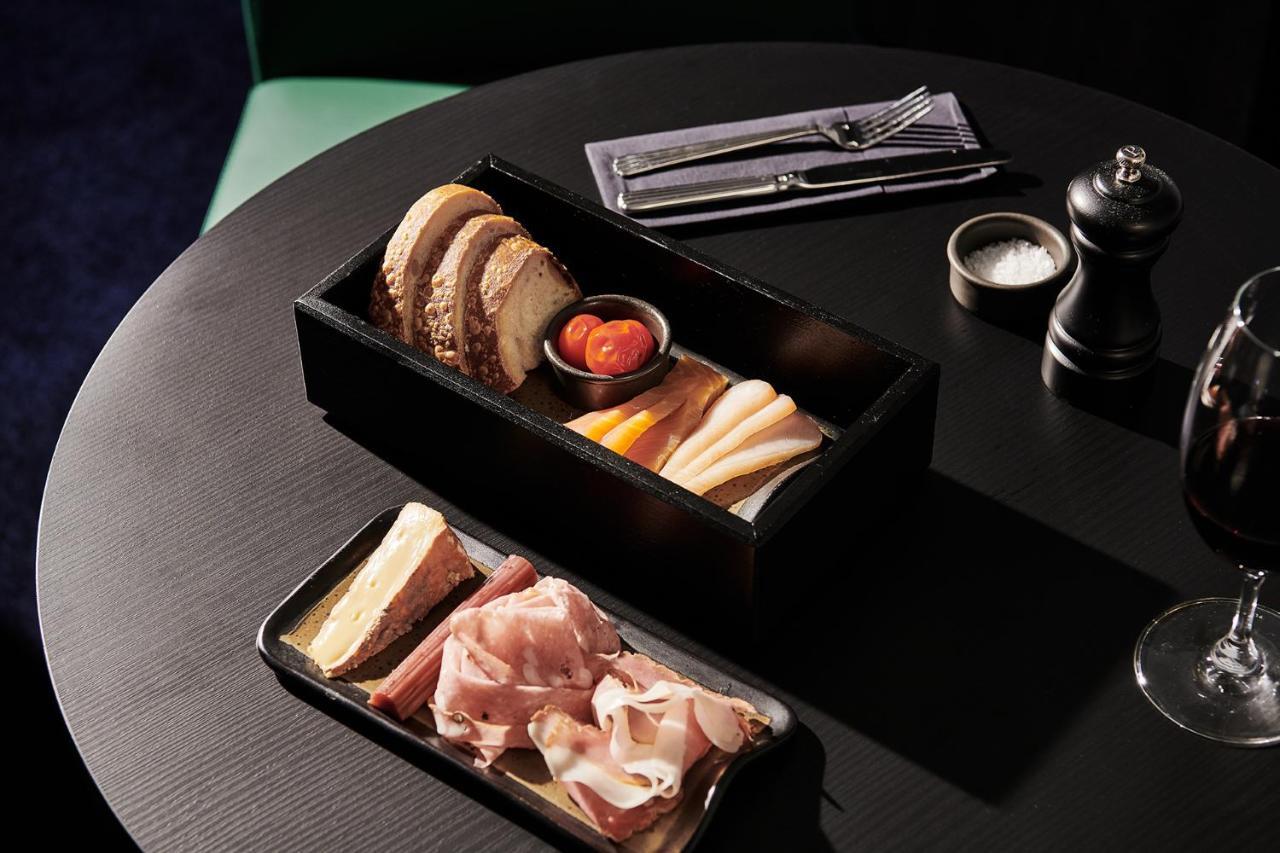 Midnight Hotel, Autograph Collection Κανμπέρα Εξωτερικό φωτογραφία A selection of cured meats and cheeses